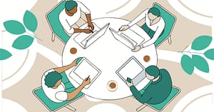 A diverse group of small business owners co-creating around an AI assistant interface. Warm, natural light. Collaborative, human-focused workspace.